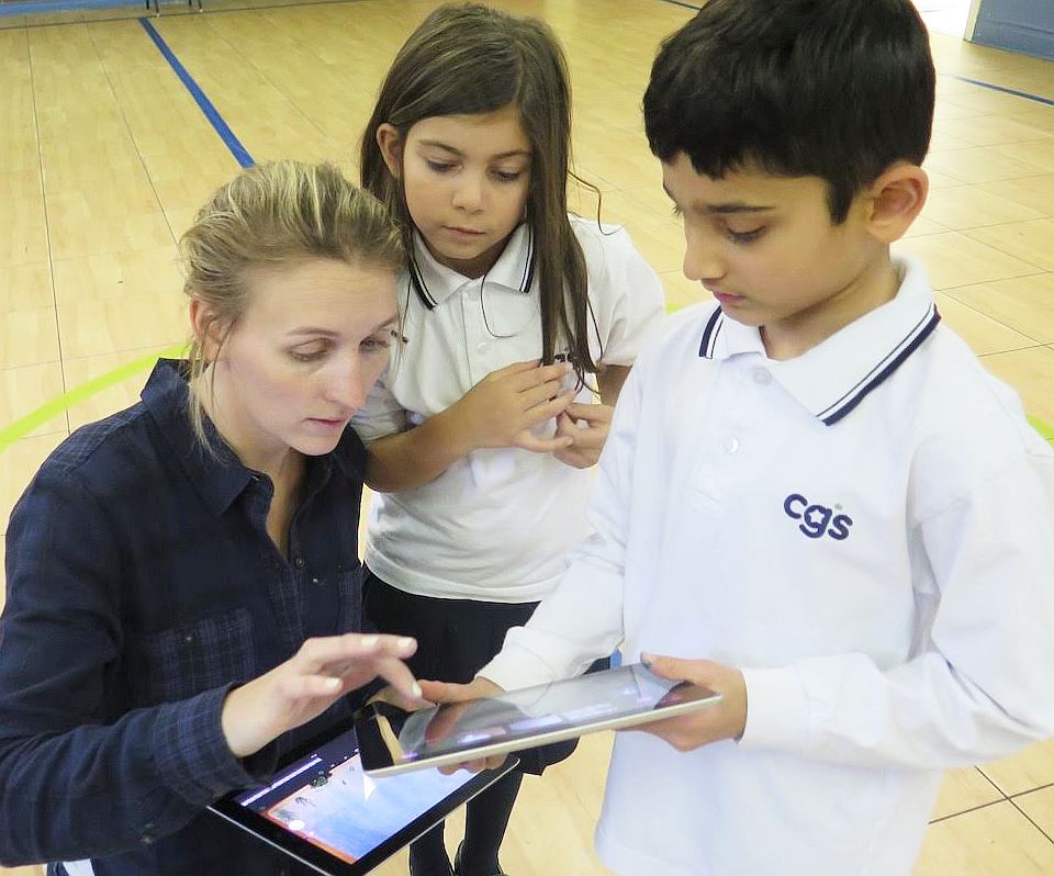 teacher ceci shows students how